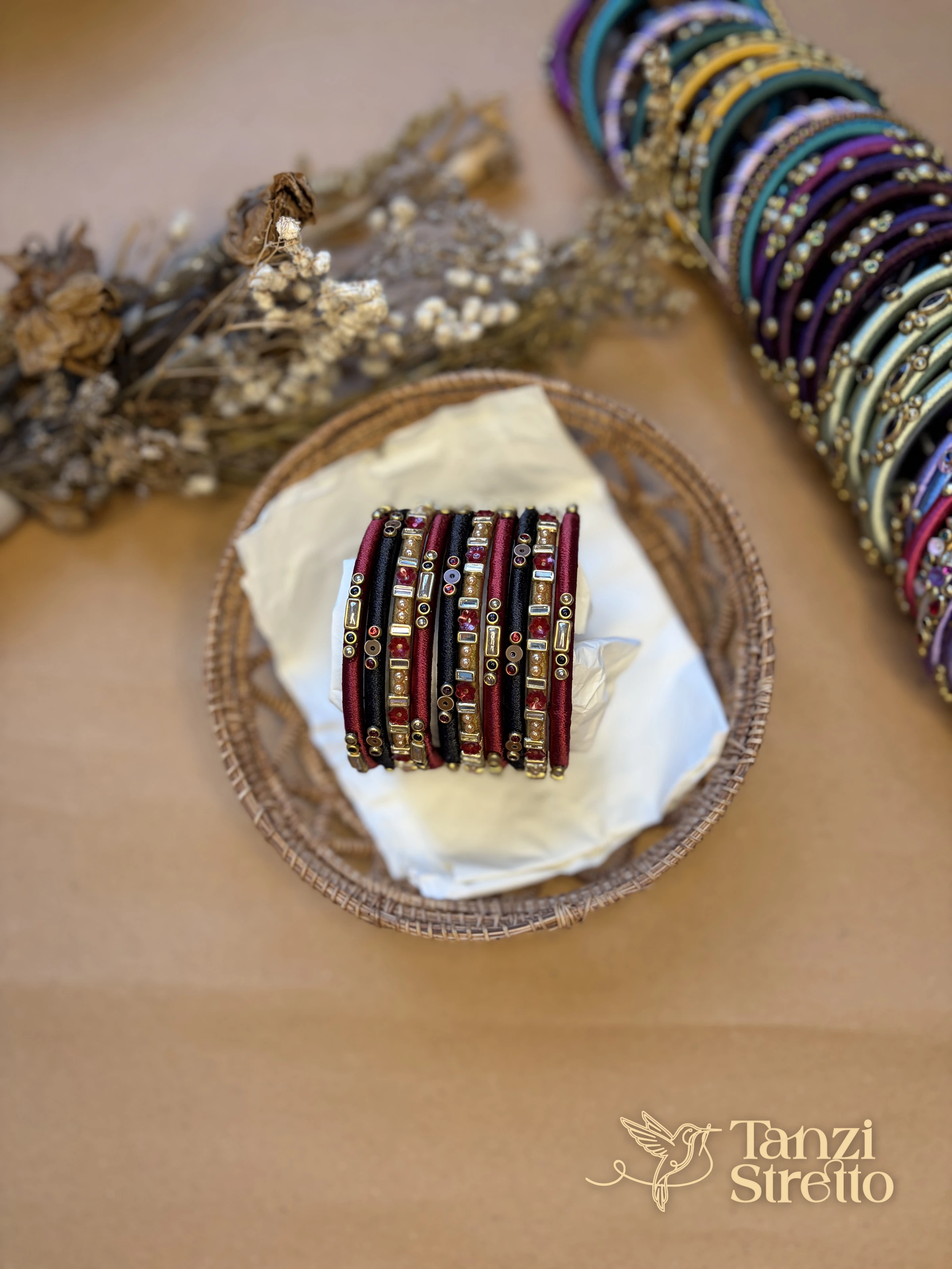 Anonya 2.0 bangles with more bangles stacked behind