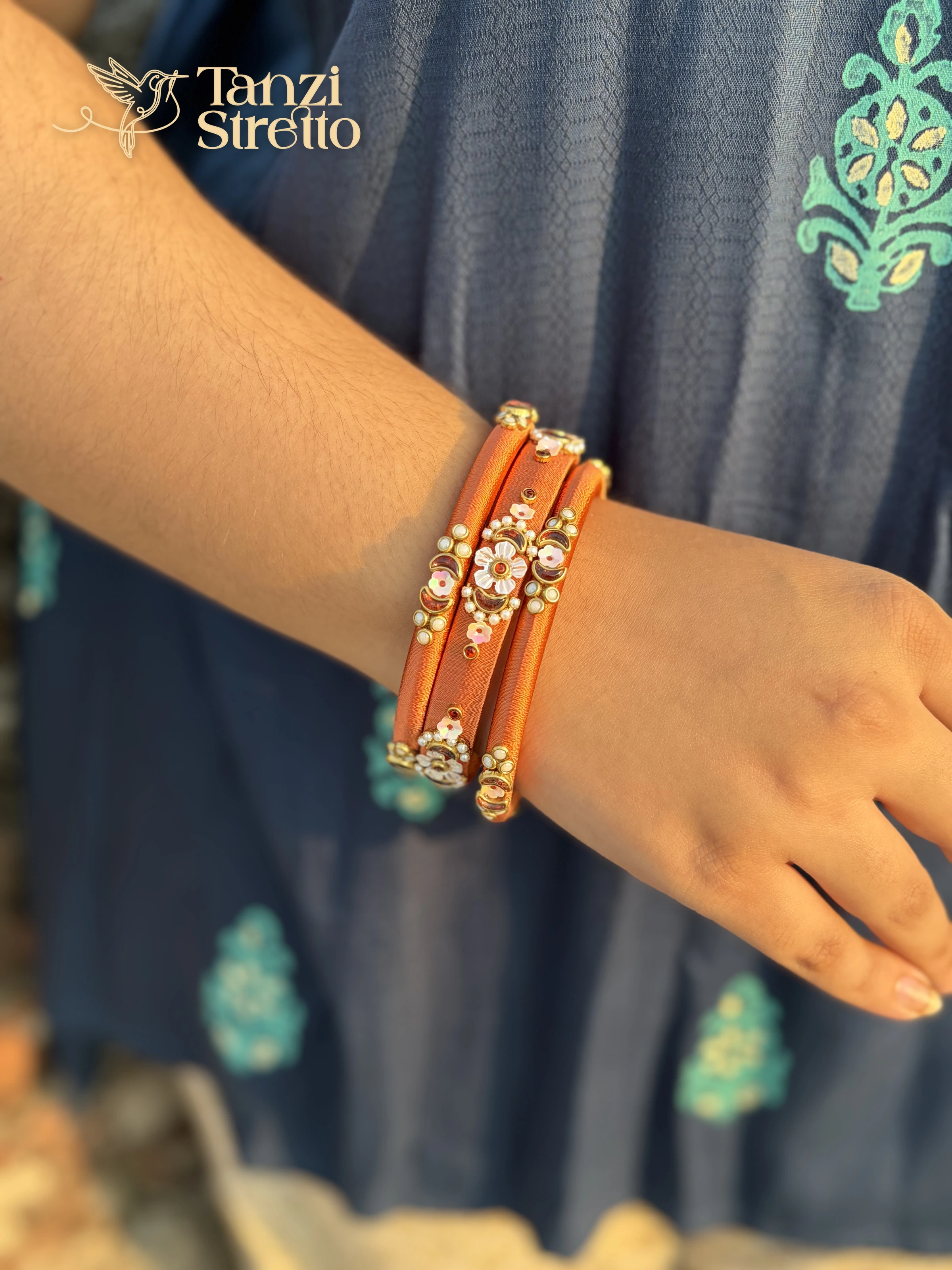 Shiuli bangles worn over a blue printed kurta